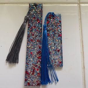 Homemade resin multi colored glitter bookmarks.
